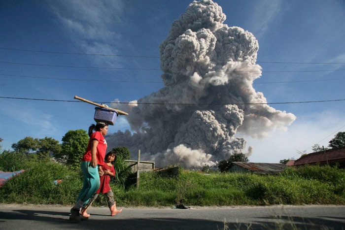 Narendra Modi, Barack Obama, Sister Nirmala, Ramadan, Afghan Parliament, Karachi Heat Wave, Mumbai Rains, International Yoga Day, Bobby Jindal, Bobby Jindal children, Slade Jindal, Shaan Jindal, Selia Jindal, Supriya Jindal, Mount Sinabung volcano, Top Frames, Indian Express, The Indian Express