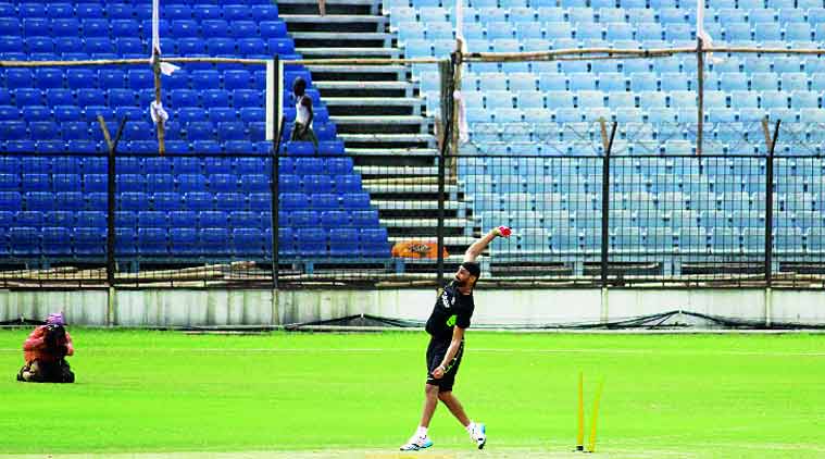 A day before his comeback game, Harbhajan Singh practiced on the centre square in Fatullah. He hasn’t taken the cricket field since.(Express Photo by: Daksh Panwar)