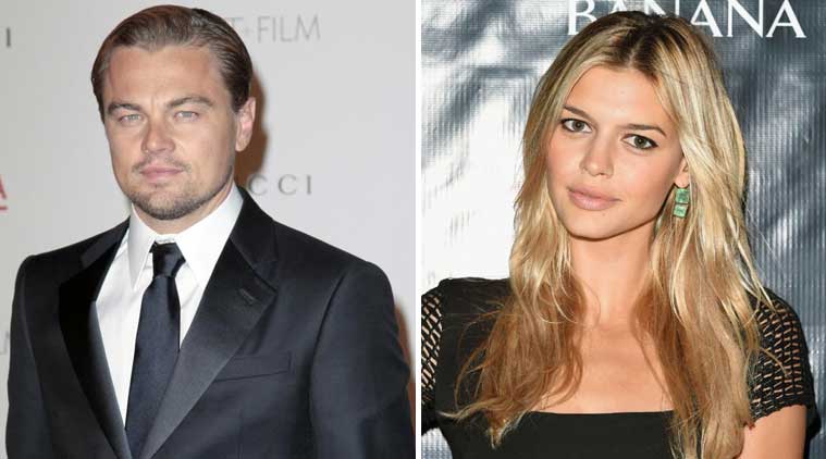 Leonardo DiCaprio, Kelly Rohrbach get cozy at party | Hollywood News ...