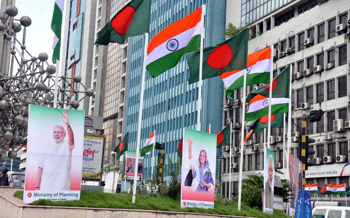 Narendra Modi Bangladsh visit, Narendra Modi maiden Bangladsh visit, Narendra Modi dhaka visit, Narendra Modi mamata banerjee bangladesh visit, LBA Narendra Modi mamata banerjee, Sheikh Hasina, Kolkata-Dhaka-Agartala bus service, Narendra Modi news, india news, bangladesh news, india bangladesh relation, indian express news