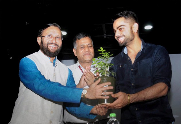 World Environment Day, Narendra Modi, Arvind Kejriwal, Virat Kohli, Sachin Tendulkar, Rohit Sharma, Ajinkya Rahane, Sushil Kumar, Prakash Javadekar, Rajendra Kumar Tiwari, New Delhi, Allahabad, tree plantation programme, Narendra Modi plant Saplings, Arvind Kejriwal plant saplings, Virat Kohli Plant Saplings, Sachin Tendulkar plant Saplings