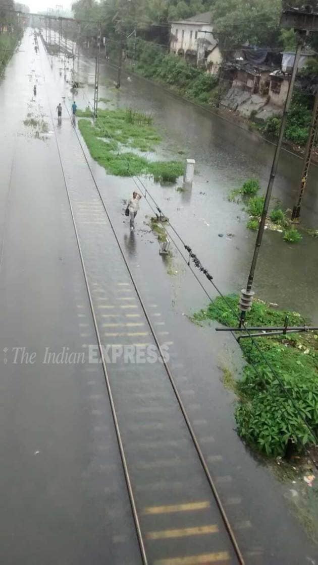 Mumbai rains Defying downpour, city comes back on track Picture