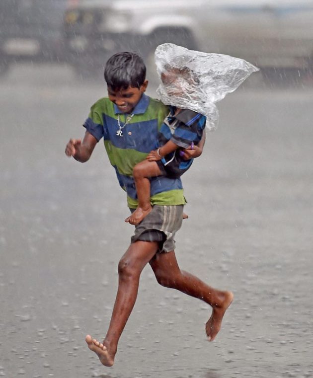 Monsoon, Monsoon pictures, Mumbai Rains, Monsoon 2015, Mumbai Monsoon, Ahmedabad Rains, Kolkata Rain 2015, Rains 2015, India weather, Nation news, India news, #NewsInPictures