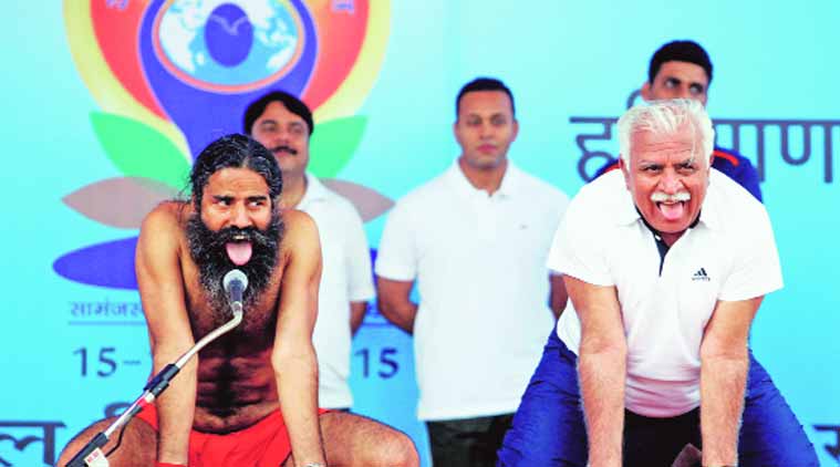 international yoga day, yoga day, ramdev baba, asanas midway , yoga guru, chandigarh news, india news, nation news, national news, Indian Express