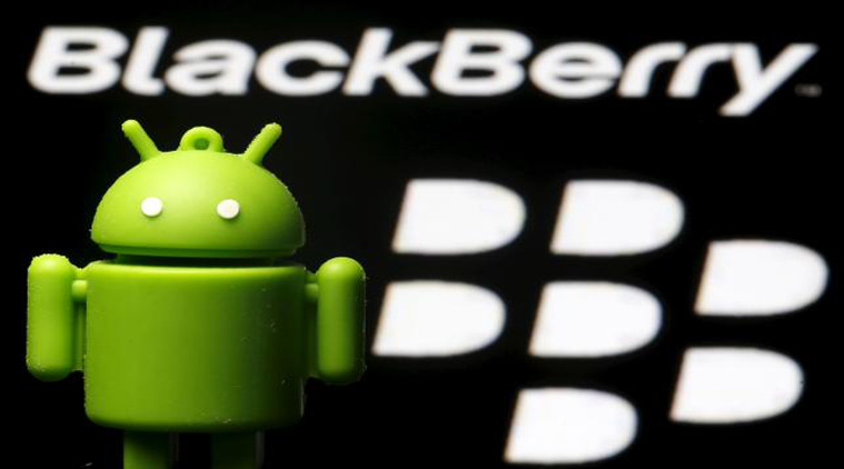 An Android mascot is seen in front of a Blackberry logo (Source: Reuters)