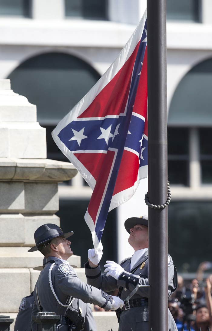 Confederate Flag, Confederate Flag removed, Confederate Flag lowered, South Carolina Confederate Flag, Charleston shooting, Charleston church attack, Charleston shooting Confederate Flag, Confederate Flag bill, Confederate Flag removed bill, Confederate Flag removal protest, Confederate Flag removal ceremony, USA news, Columbia Confederate Flag news, South carolina news, america news world news, international news, latest news, top stories