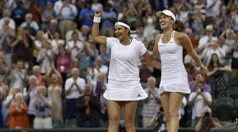 Sania Mirza and Martin Hingis defeated Ekaterina Makarova and Elena Vesnina to win the Wimbledon Women's Doubles title (Source: Reuters)