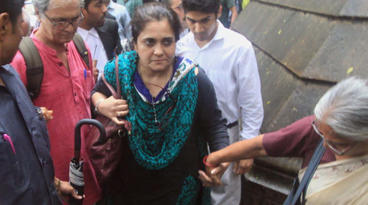 A file photo of Teesta Setalvad and her husband Javed Anand outside a court in Mumbai. (Source: Express photo by Ganesh Shirsekar)