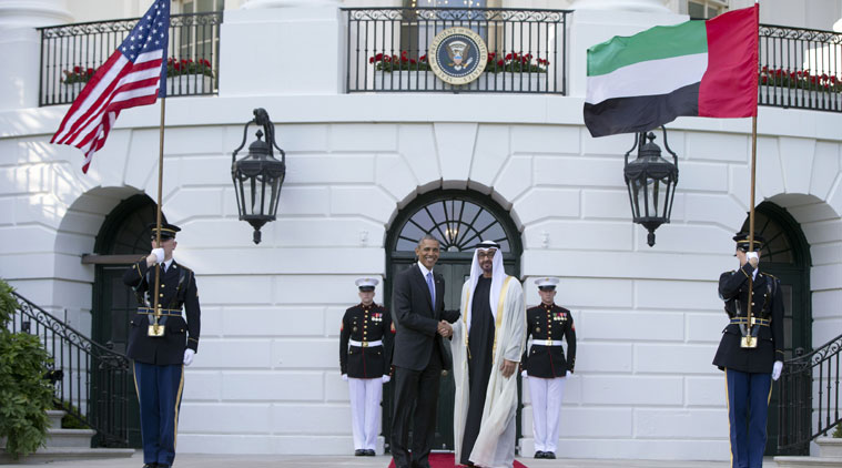 FILE - In this Wednesday, May 13, 2015 file photo, President Barack Obama, left, shakes hands with Sheikh Mohamed bin Zayed Al Nahyan, Crown Prince of Abu Dhabi, Deputy Supreme Commander of the UAE Armed Forces and Chairman of the Executive Council of the Emirate of Abu Dhabi, as he arrives at the South Lawn of the White House in Washington. The U.S. and Emirati governments said they have launched a new digital communications center focused on using social media to counter the Islamic State group's active online propaganda efforts. The new Sawab Center, based in Abu Dhabi, became operational Wednesday, July 8. (AP Photo/Carolyn Kaster, File)