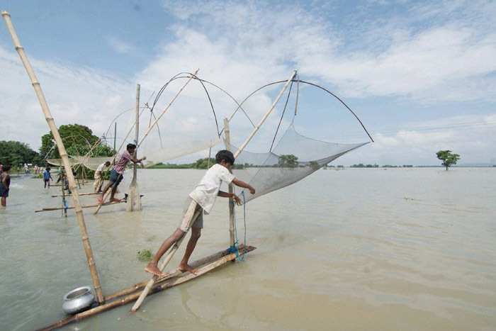 Floods in Assam, Floods in Guwahati, Floods in Kaziranga, Floods in Morigaon, Assam Floods, Indian monsoon Floods, India Floods, Monsoon Floods, Heavy Rainfall, Heavy rains, Heavy rains in Assam, Assam Floods Information, Assam Floods rescue operation, Assam Floods News, Floods News, India Floods News
