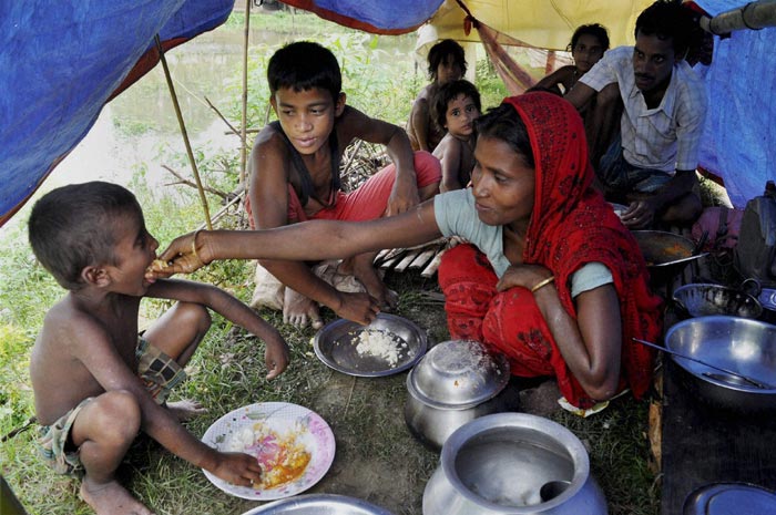 Floods in Assam, Floods in Guwahati, Floods in Kaziranga, Floods in Morigaon, Assam Floods, Indian monsoon Floods, India Floods, Monsoon Floods, Heavy Rainfall, Heavy rains, Heavy rains in Assam, Assam Floods Information, Assam Floods rescue operation, Assam Floods News, Floods News, India Floods News