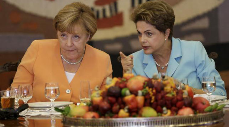 Germany's Chancellor Angela Merkel (L) listens to Brazil's President Dilma Rousseff during a lunch at the Itamaraty Palace in Brasilia, Brazil, August 20, 2015. (Source: Reuters photo)
