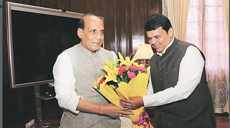 Union home minister Rajnath Singh with CM Devendra Fadnavis on Thursday in New Delhi. (Source: Express photo)