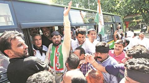 Confined by police, Congress members protest inside party headquarter ...