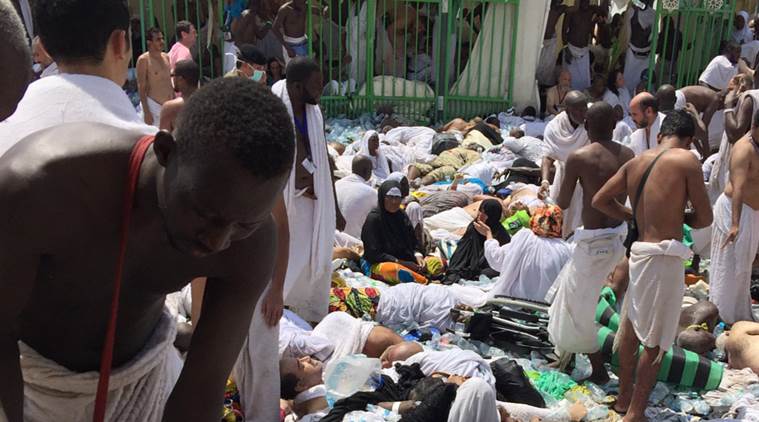 Muslim pilgrims gather around the victims of a stampede in Mina, Saudi Arabia during the annual hajj pilgrimage on Thursday. (Source: AP photo)