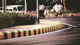 kerbstones, delhi kerbstones, pink and green, black and yellow, NDMC, delhi traffic, BJP, delhi news, indian express
