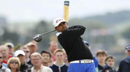 Anirban Lahiri of India watches his tee shot on the fourth hole during the final round of the British Open golf championship on the Old Course in St. Andrews, Scotland, July 20, 2015.  REUTERS/Lee Smith