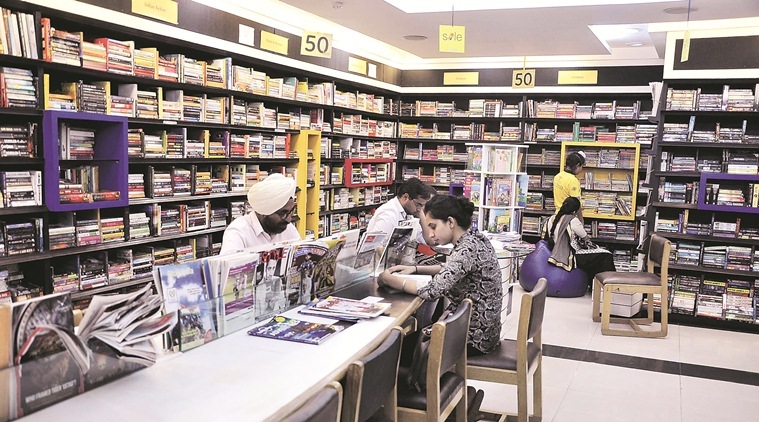 library, book reading,printed book love, book reading culture, printed book reaidng culture, technology v/s print books, library, chandigarh library, indian express