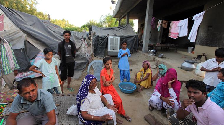 Dalit families of Mirchpur living on tents at Tanwar Farm on Rajgarh road in Hisar after riots in Mirchpur village in district Hisar, September 10 2015. Express Photo by Kamleshwar Singh
