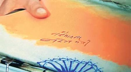 Narendra modi, modi flag, modi signs flag, modi flag controversy, modi flag news, narendra modi flag, narendra modi signs flag, india news, modi in us, modi us trip, latest news