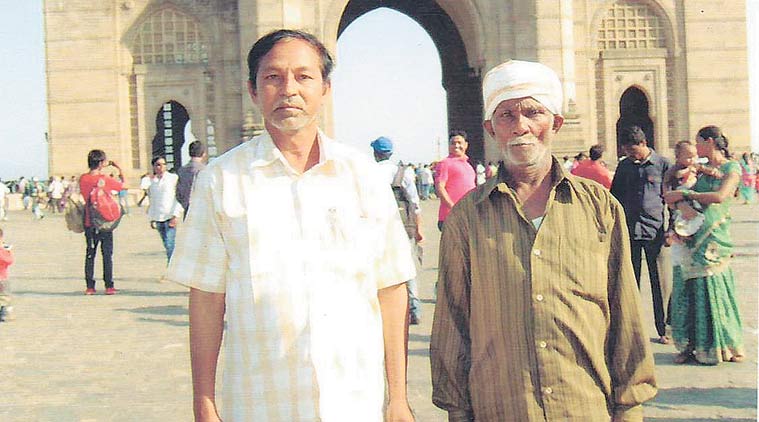 Patru Durge (left) with a fellow villager in Mumbai in February 2015, two months before he was killed by Naxals.