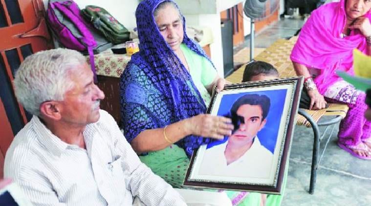 The victim’s family members at Kishangarh village, Chandigarh, on Saturday. Jaipal Singh