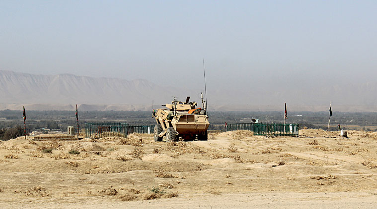 An Afghan National Army vehicle is staged outside of Kunduz city. (Source: AP photo)