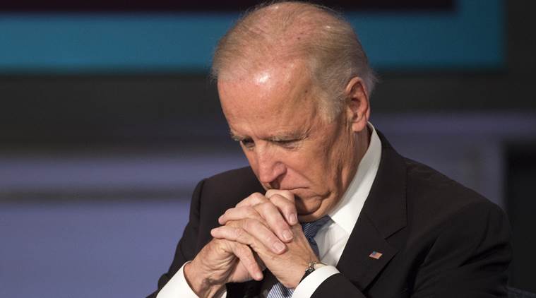 Vice President Joe Biden pauses at George Washington University in Washington, Tuesday, Oct. 20, 2015, during a forum to honor the legacy of former Vice President Walter Mondale. (AP Photo/Molly Riley)