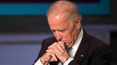 Vice President Joe Biden pauses at George Washington University in Washington, Tuesday, Oct. 20, 2015, during a forum to honor the legacy of former Vice President Walter Mondale. (AP Photo/Molly Riley)