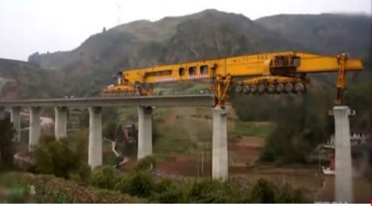 Segment Bridge Launching Machine China is using to build bridges/ Screenshot