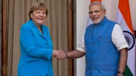 angela merkel, angela merkel durga idol, narendra modi, modi merkel, modi angela merkel, durga idol, durga ido kashmir, stolen durga idol, stolen kashmir durga idol, india, germany, latest news