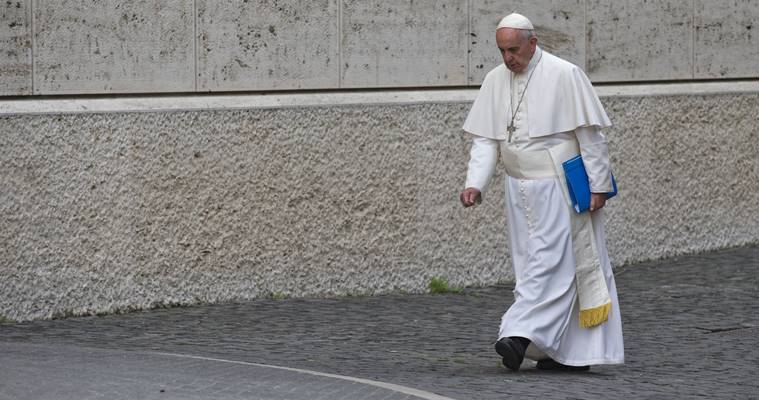 Pope Francis arrives for the afternoon session of the Synod of bishops, at the Vatican, Wednesday. AP Photo