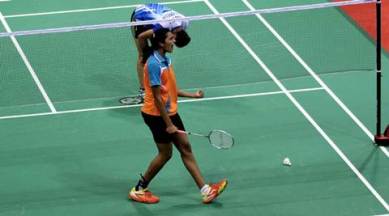 PV Sindhu of India celebrates after won the women single quarter final match against Bellaetrix Manuputty of Indonesia during the Thomas and Uber cup final 2014, at Siri fort sports complex, in New Delhi on 22nd 2014. Express photo by Ravi Kanojia