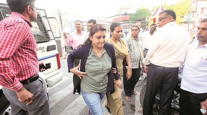 Vadodara police produce Maria Susairaj in court, seeking custody on Friday in the fraud of Rs 2.11cr. (Express Photo by Bhupendra Rana)