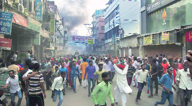 Protesters clash with police in Varanasi on Monday. Avishek Gupta