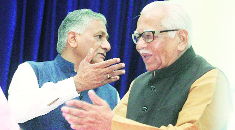 Governer Ram Naik reacts after releasing Union minister General V K Singh’s book, Sahas evam Sankalp, at Raj Bhavan in Lucknow on Saturday. (Vishal Srivastav)