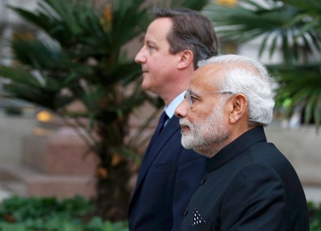 Narendra Modi, David Cameron, Modi in UK, Modi UK visit, Modi UK photos, Modi visits UK, Modi London protest, Modi Cameron, Modi 10 downing street, modi david, modi united kingdom, India UK relationship, Modi UK pictures, World news