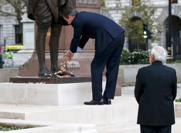 Narendra Modi, David Cameron, Modi in UK, Modi UK visit, Modi UK photos, Modi visits UK, Modi London protest, Modi Cameron, Modi 10 downing street, modi david, modi united kingdom, India UK relationship, Modi UK pictures, World news