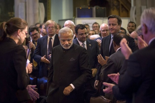 Narendra Modi, David Cameron, Modi in UK, Modi UK visit, Modi UK photos, Modi visits UK, Modi London protest, Modi Cameron, Modi 10 downing street, modi david, modi united kingdom, India UK relationship, Modi UK pictures, World news