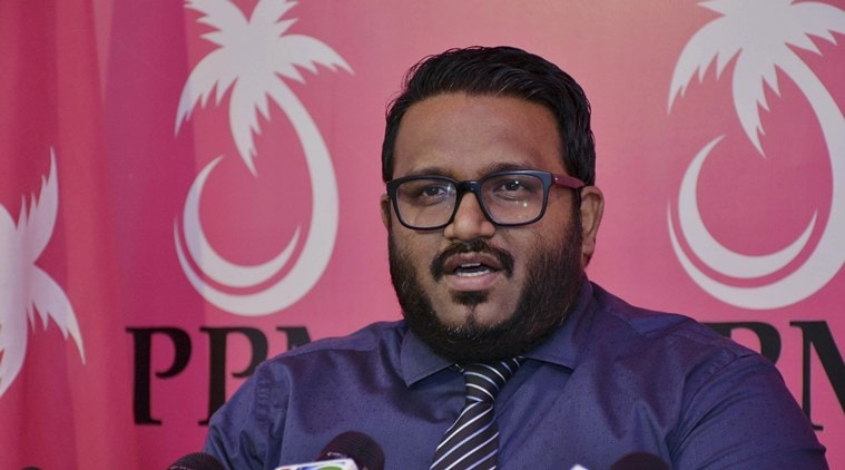 In photo taken on Wednesday, Oct. 7, 2015, Maldives Vice President Ahmed Adeeb speaks to media in Male, Maldives. The vice president of the Maldives will be charged with high treason after being arrested Saturday, Oct. 24, 2015 in connection with an explosion aboard the president's boat last month that authorities have called an assassination attempt, officials said. (Fayaz Moosa/Sun Media Group via AP) 