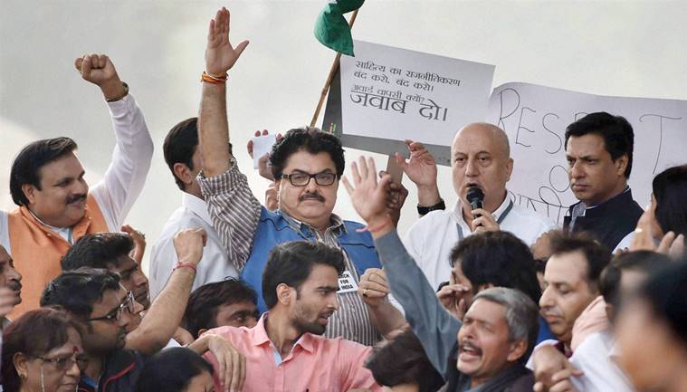 Bollywood actor Anupam Kher with Manoj Joshi, Ashoke Pandit and Madhur Bhandarkar during their 'March for India' programme over intolerance in New Delhi. PTI Photo