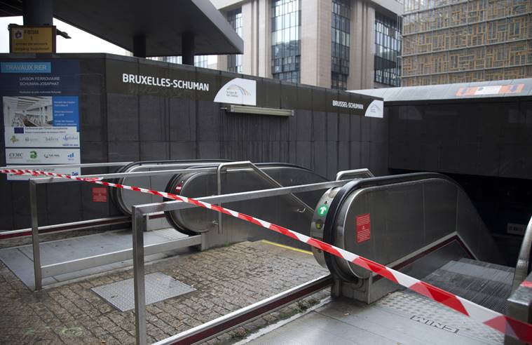 Police tape blocks the entrance of a metro station in Brussels. Belgium raised its security level to the highest degree on as the manhunt continues for extremist Salah Abdeslam who took part in the Paris attacks. (AP Photo/Virginia Mayo)