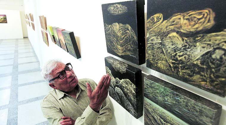 Baldev Gambhir with his painting at Punjab Kala Bhawan in Sector 16, Chandigah, on Thursday. Jaipal Singh