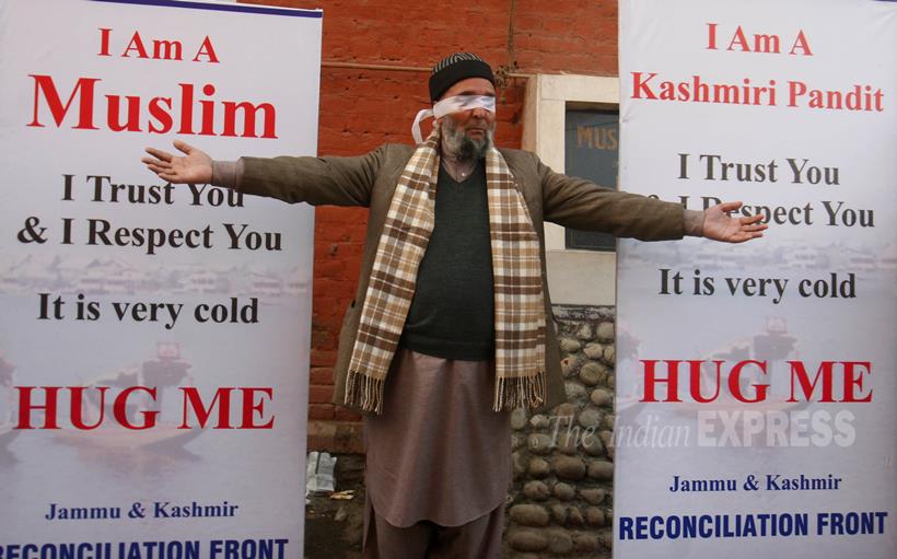 Kashmiri Pandit, Hug Campaign, Jammu and Kashmir, tolerance, Brotherhood, Interfaith Dialogue, Sandeep Mawa, Blindfolded Kashmiri Pandit, Kashmiri Pandit invites hugs, Promote Brotherhood, Kashmir News, Jammu News, Jammu and Kashmir news, Srinagar news