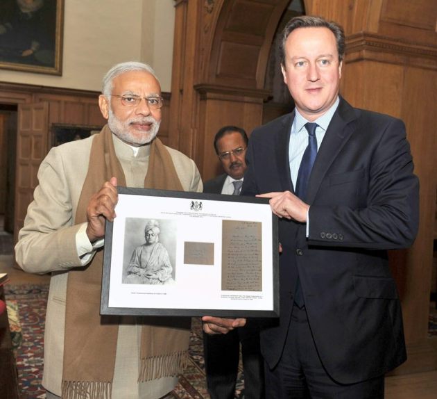 Narendra Modi, Queen Elizabeth II, Modi meets Queen, Modi in UK, Modi Elizabeth gift, Modi UK visit, David Cameron, Modi UK photos, Modi visits UK, Modi London protest, Modi Cameron, Modi 10 downing street, modi david, modi united kingdom, Modi UK Day 1, Modi UK Day 2, India UK relationship, Modi UK pictures, World news