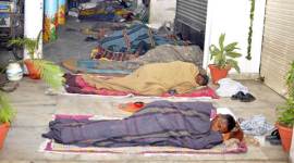 Beggars and Rickshaw pullers sleeping in fronts of Shops no alt set