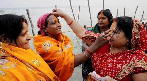 Women celebrate Chhath Puja in Patna. (Source: PTI photo)