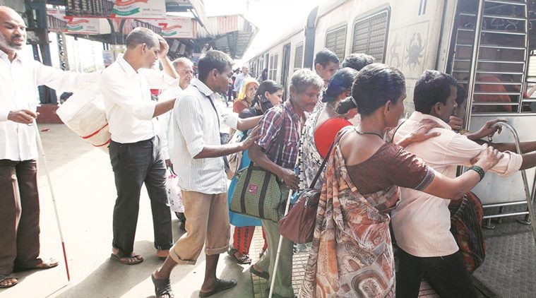 Residents of the village climb on a local train to Mumbai to hawk their wares (Source: Pavan Khengre)
