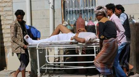 People carry a man who was injured in clashes between tribal fighters and Shiite rebels known as Houthis, in Taiz, Yemen, Sunday, Oct. 25, 2015. Yemen's fighting pits the Houthis and allied army units against forces loyal to the internationally recognized government as well as southern separatists and other militants. The U.N. says at least 2,577 civilians were killed since the Saudi-led air campaign began in March, while 5,078 have been injured. (AP Photo/Abdulnasser Alseddik)