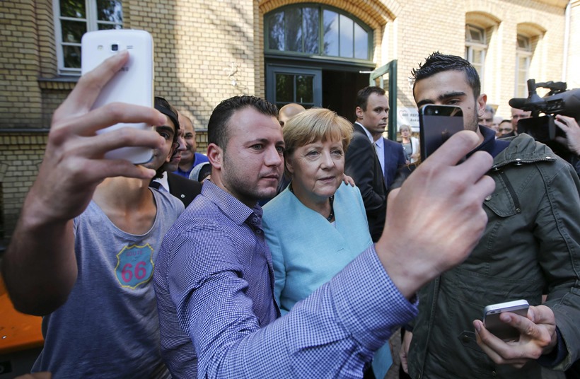 Mark Zuckerberg, Mark Zuckerberg Daughter, Vladimir Putin, Vladimir Putin Workout, Barack Obama, Barack Obama Selfie, Hillary Clinton, Dilma Rousseff, Francois Hollande, Angela Merkel, Tamil Nadu Floods, Migrant Crisis, Syrian Migrants, Justin Trudeau, Nepal Earthquake, Photos of the year, Pictures of the year, photos 2015, Pictures 2015, Pics, images, Photos, Pictures